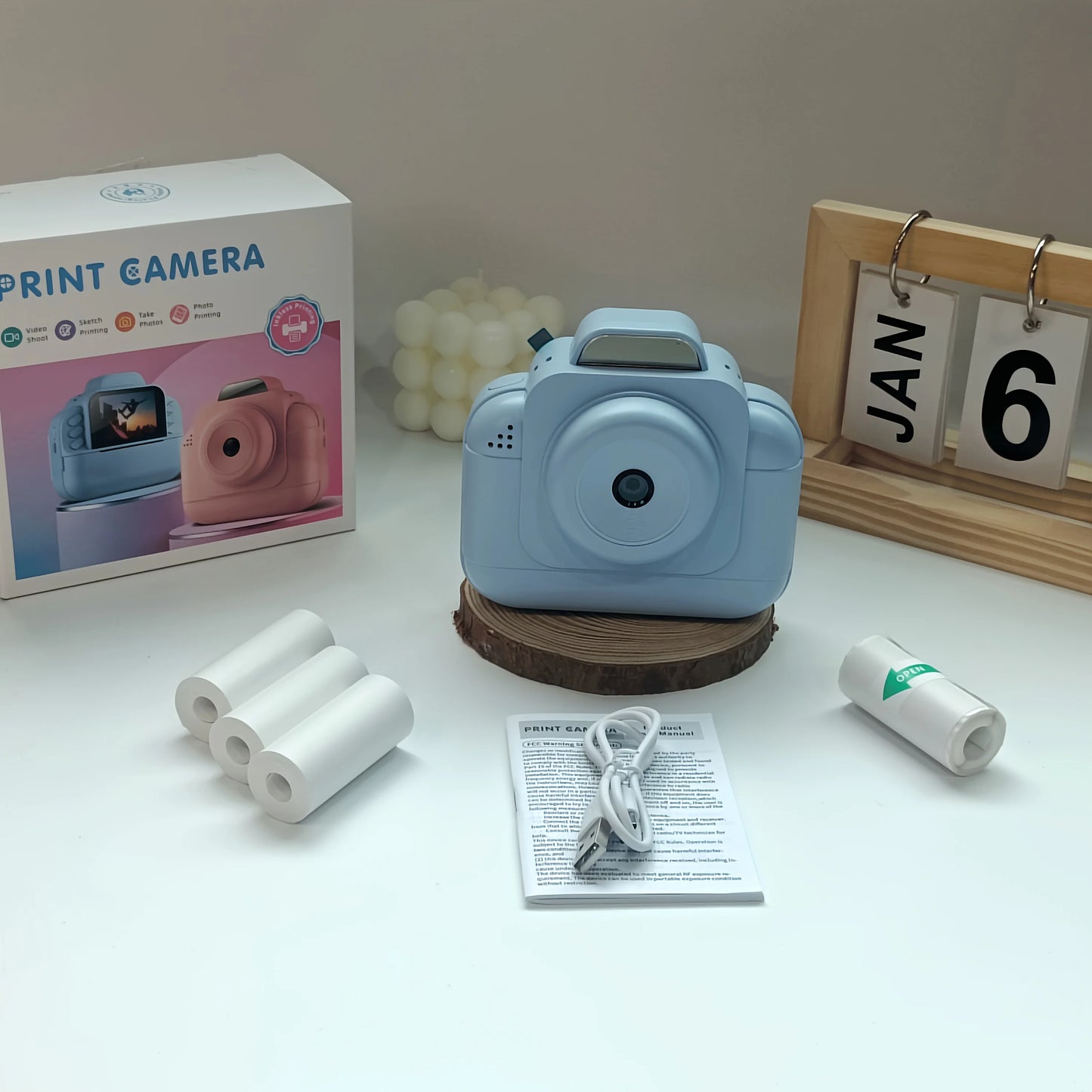 Portable photo printer (blue) with rechargeable battery and 4 rolls of thermal paper /1g card-instant photo printing