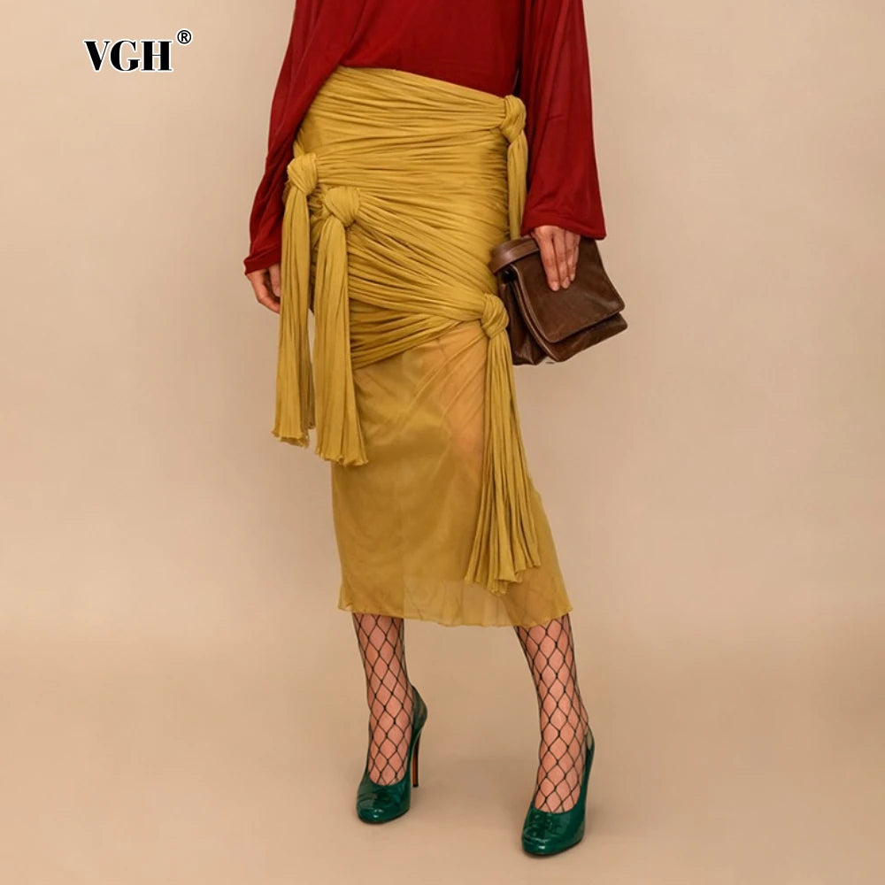 VGH Sexy Yellow Color Bodycon Midi Length Skirts for Women High Waist Spliced Bandage Folds See Through Skirt Female Autumn New