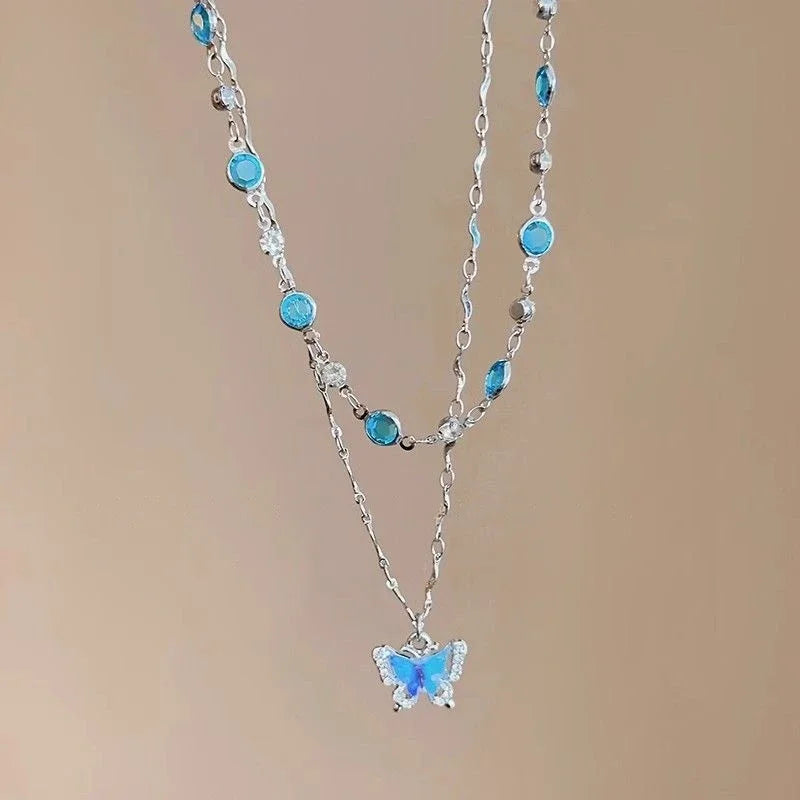 Collier ras-de-cou papillon romantique en cristal bleu LATS pour femmes et filles, simple et brillant, en zircon bicouche, chaîne clavicule, bijou raffiné.