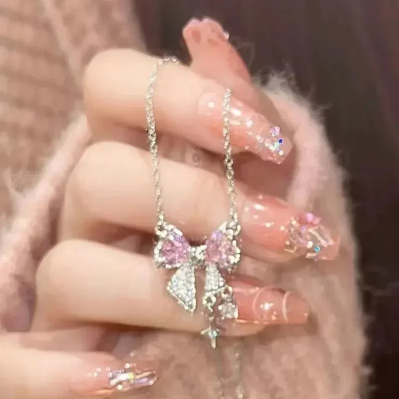 Collier pendentif nœud papillon en cristal rose féérique, style Y2K, chaîne clavicule cœur strass, bijoux femme, cadeau
