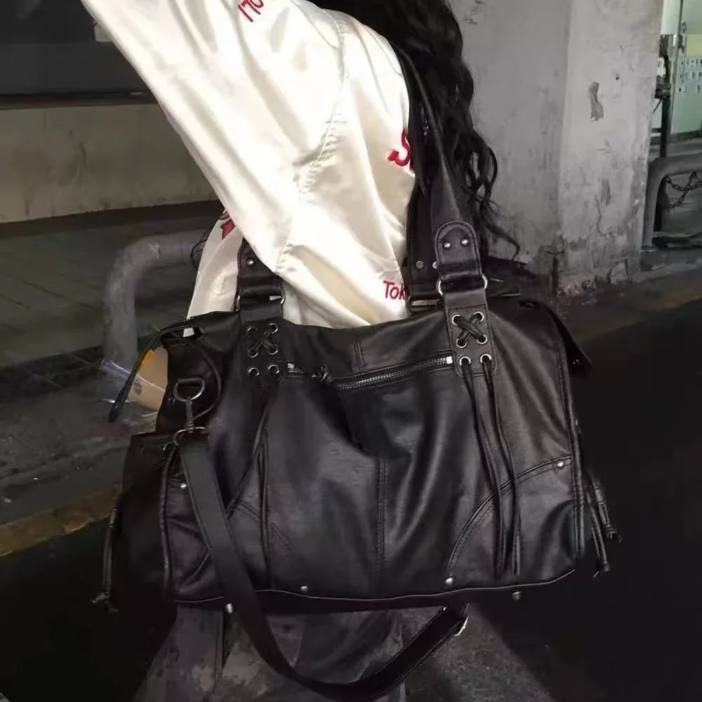 Korean brand FANCY CLUB: Large Capacity Retro Fancyclub Tote Bag with Rivets and Straps – A Motorcycle-Style Bag for Women.