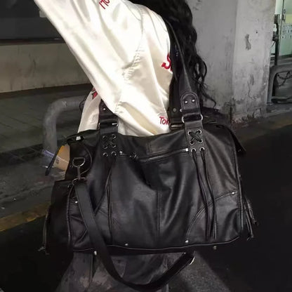 Korean brand FANCY CLUB: Large Capacity Retro Fancyclub Tote Bag with Rivets and Straps – A Motorcycle-Style Bag for Women.