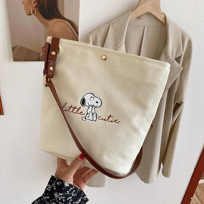2026 New Women's Snoopy Canvas Bucket Bag Embroidered "Little Cute" Cartoon Shoulder Bag Leather Strap Casual Daily Handbag