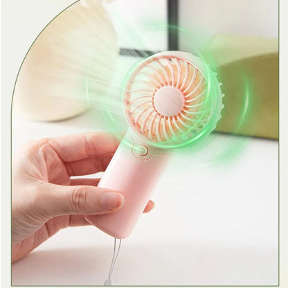 Portable Handheld Mini Fan for Summer Cooling Compact Desk Fan with Strong Airflow Simple Design Ideal for Outdoor travel Use