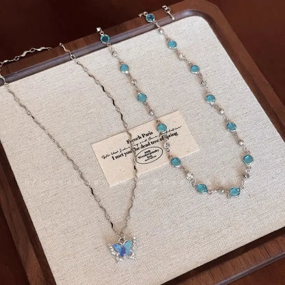 Collier ras-de-cou papillon romantique en cristal bleu LATS pour femmes et filles, simple et brillant, en zircon bicouche, chaîne clavicule, bijou raffiné.