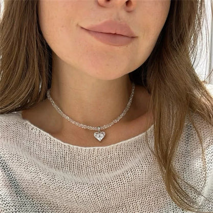 Collier pendentif cœur en zircon et pompons style vintage pour femme, style bohème géométrique baroque, chaîne en cristal transparent