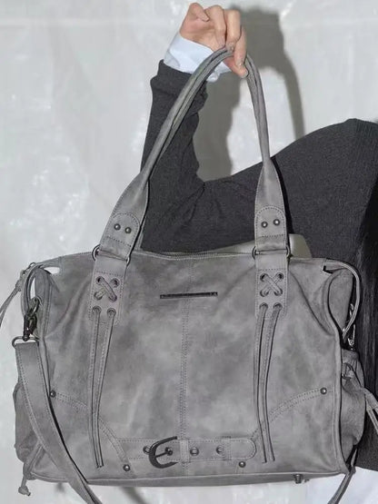 Korean brand FANCY CLUB: Large Capacity Retro Fancyclub Tote Bag with Rivets and Straps – A Motorcycle-Style Bag for Women.